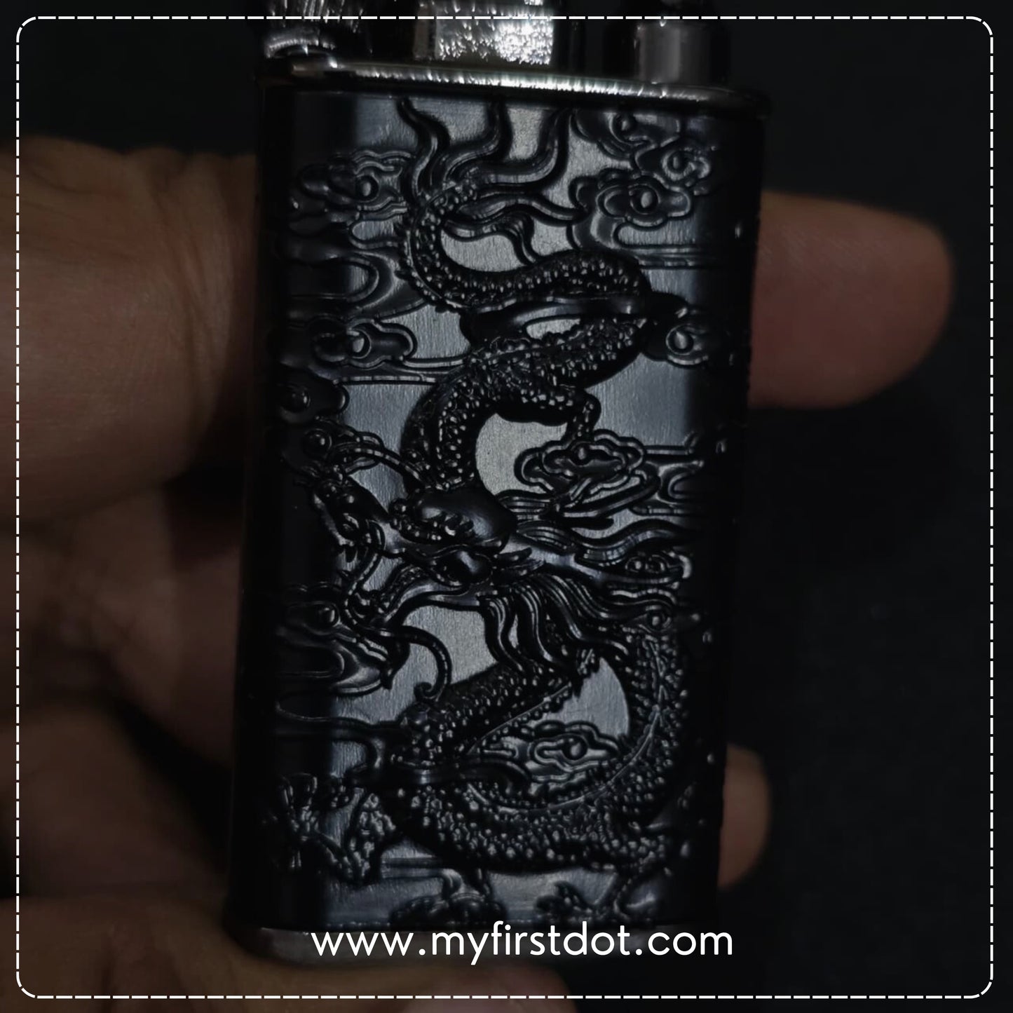 Black lighter with dragon design held in hand, brand 'myfirstdot' visible
