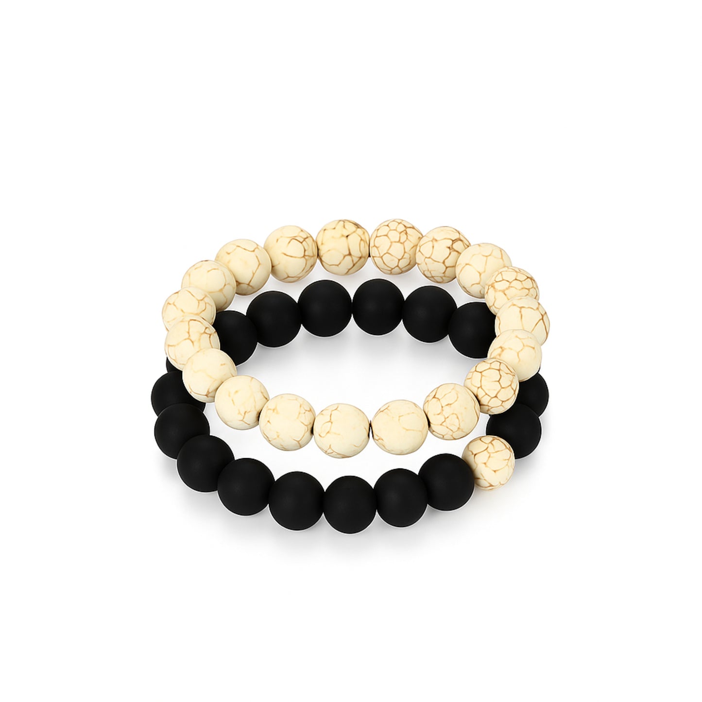 Two beaded bracelets, one with black beads and the other with cream-colored beads, on a white background. CrackleStoneBracelet