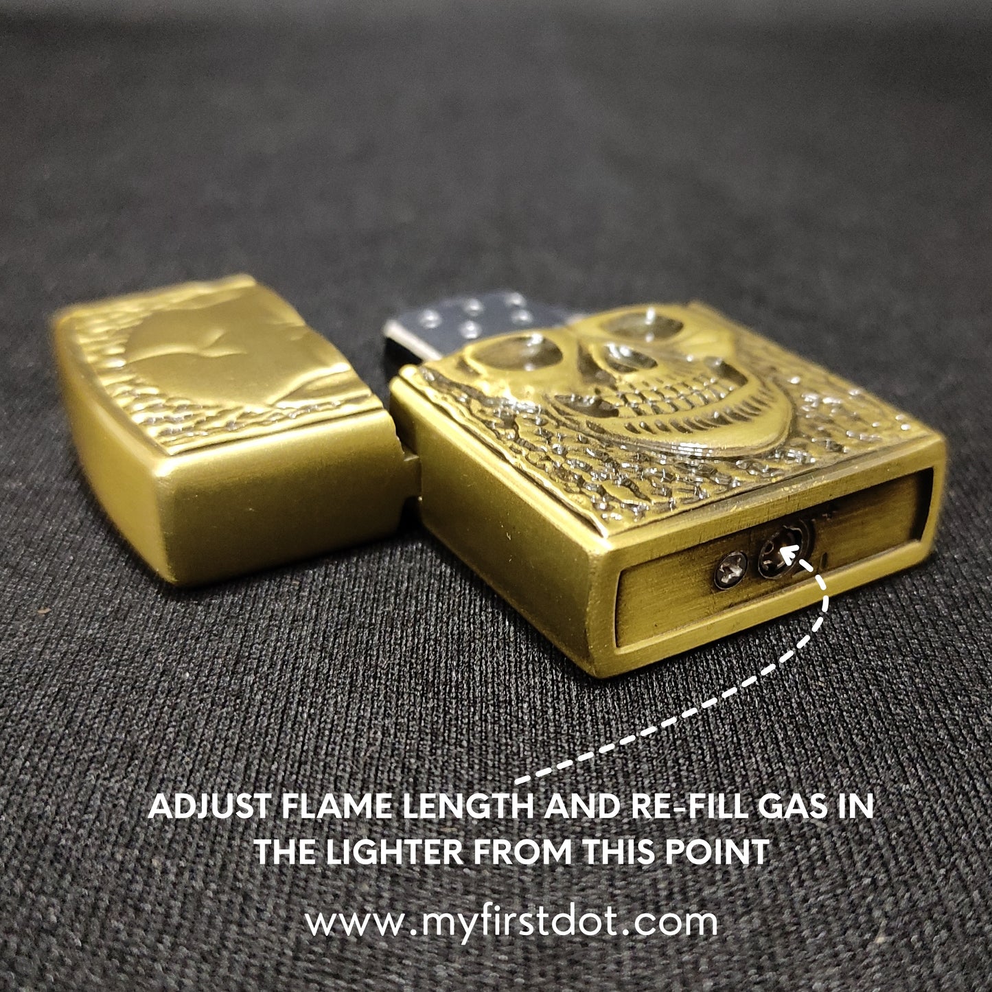 Gold lighter with skull design on a dark textured background