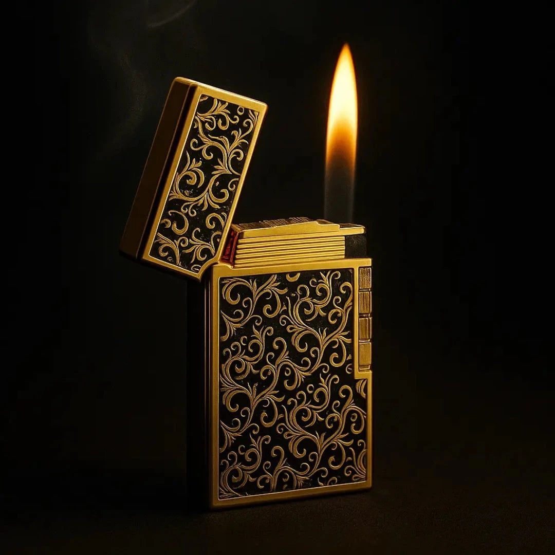 Elegant gold lighter with black swirl engravings, lit with a bright flame against a dark textured background. Cinematic lighting with soft shadows highlights its luxury design