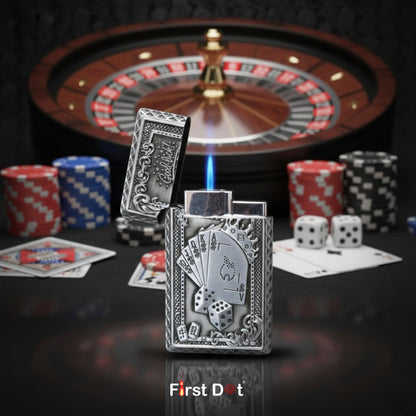 Decorative lighter with playing card design in front of a roulette wheel and casino table.