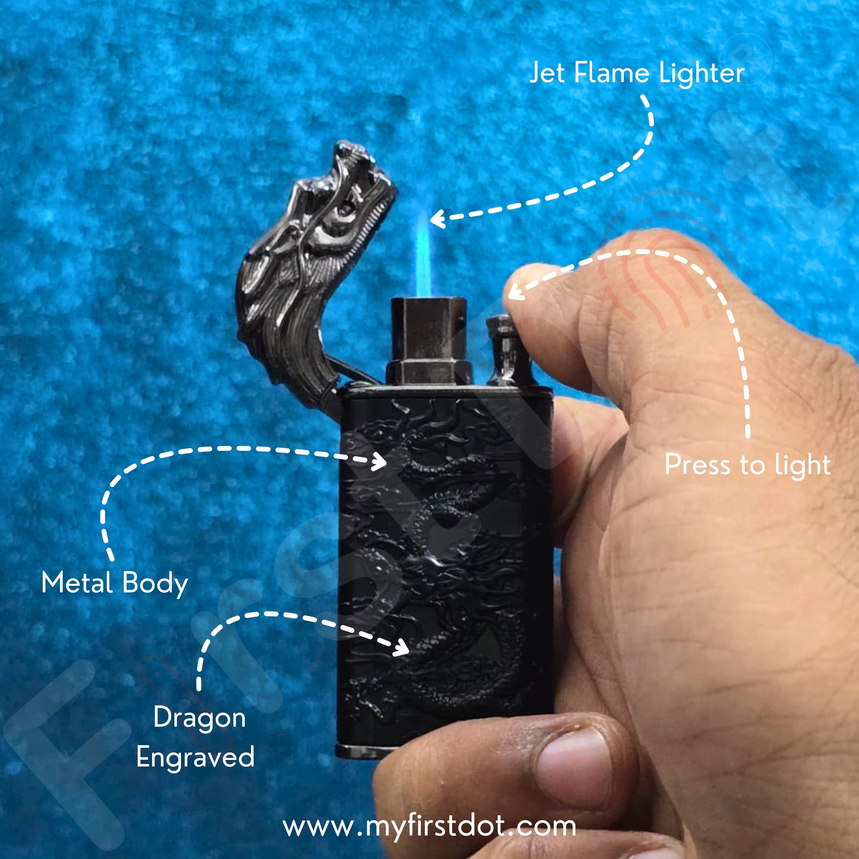 Hand holding a jet flame lighter with dragon engraving against a blue background