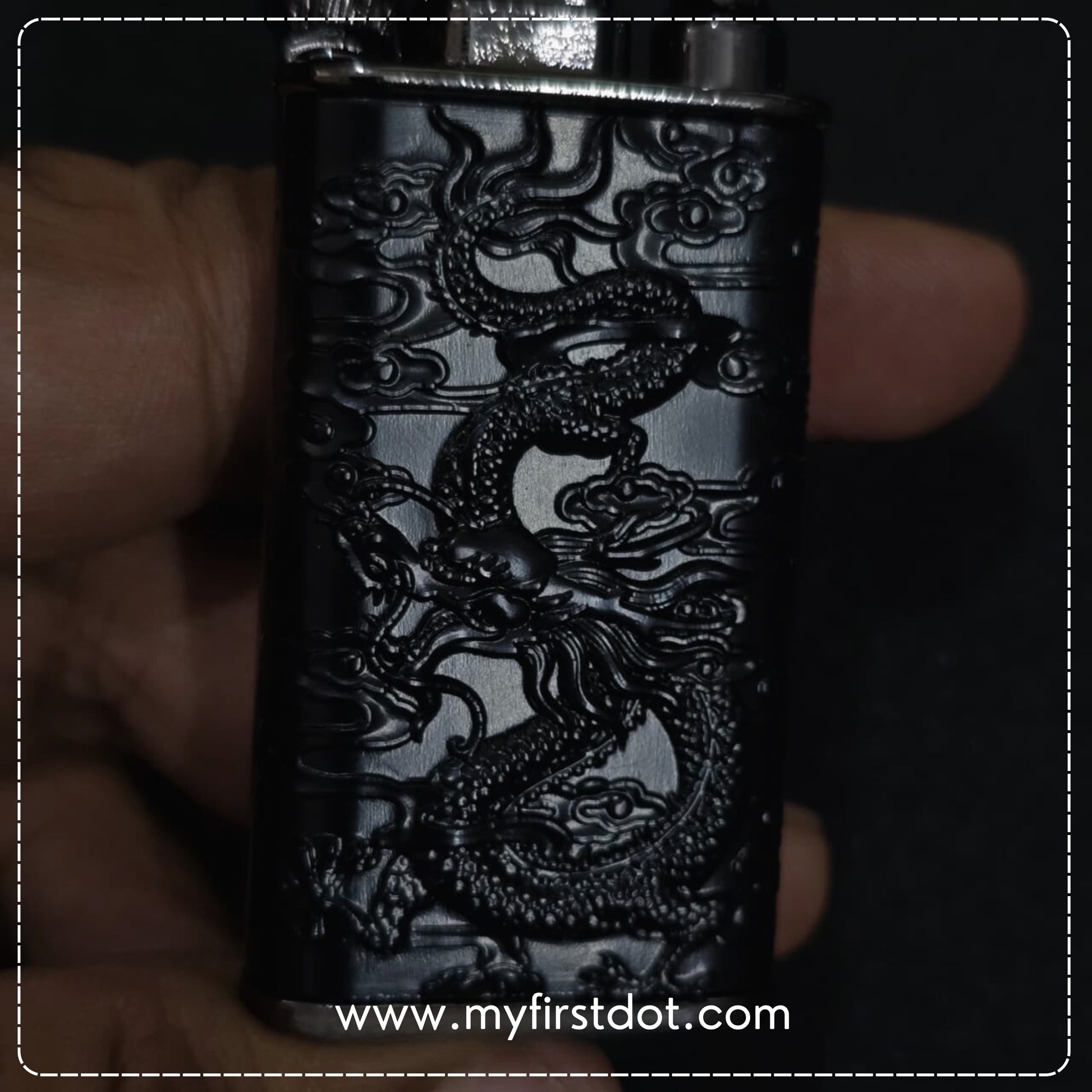 Black lighter with dragon design held in hand, brand 'myfirstdot' visible
