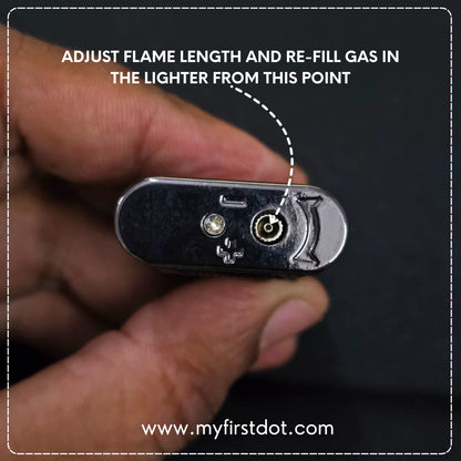 Close-up of a lighter with instructions on adjusting flame length and refilling gas, held by a hand.