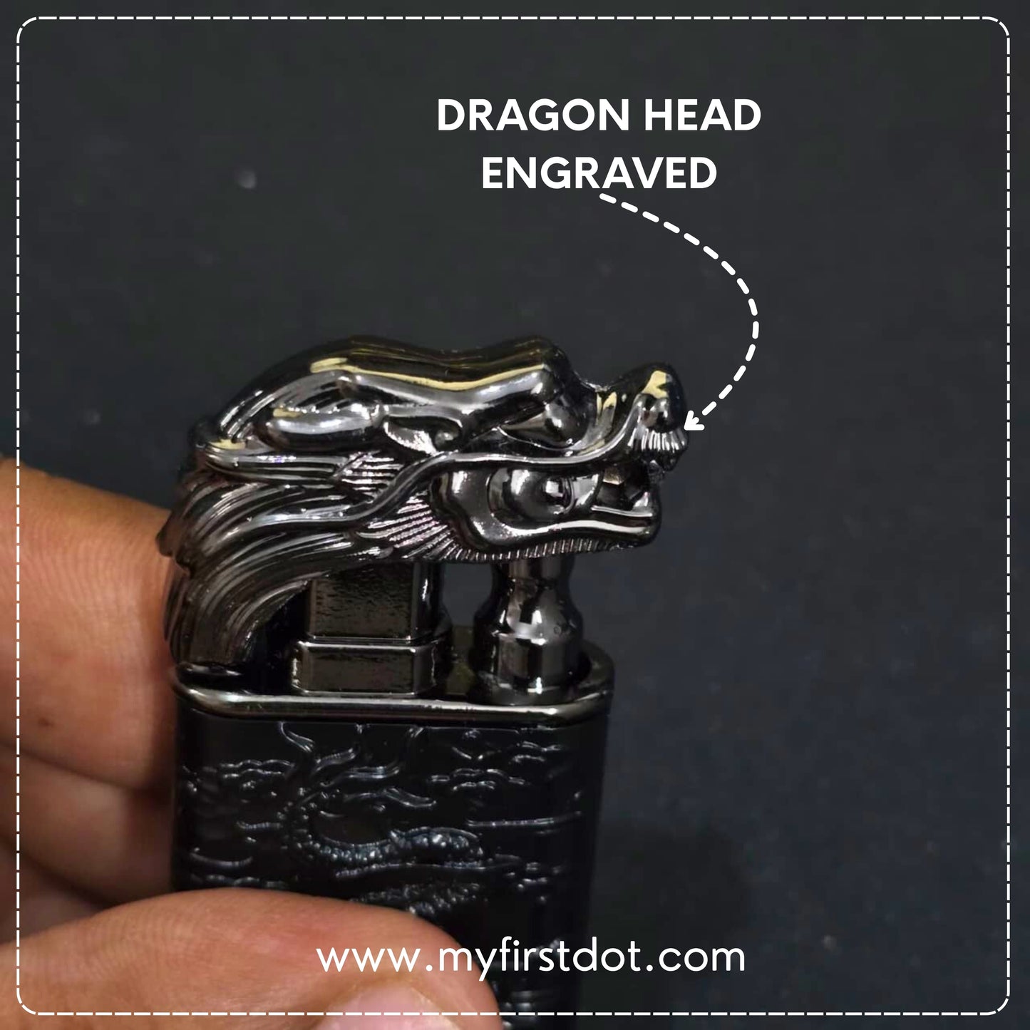 Lighter with dragon head engraving held by a hand against a dark background