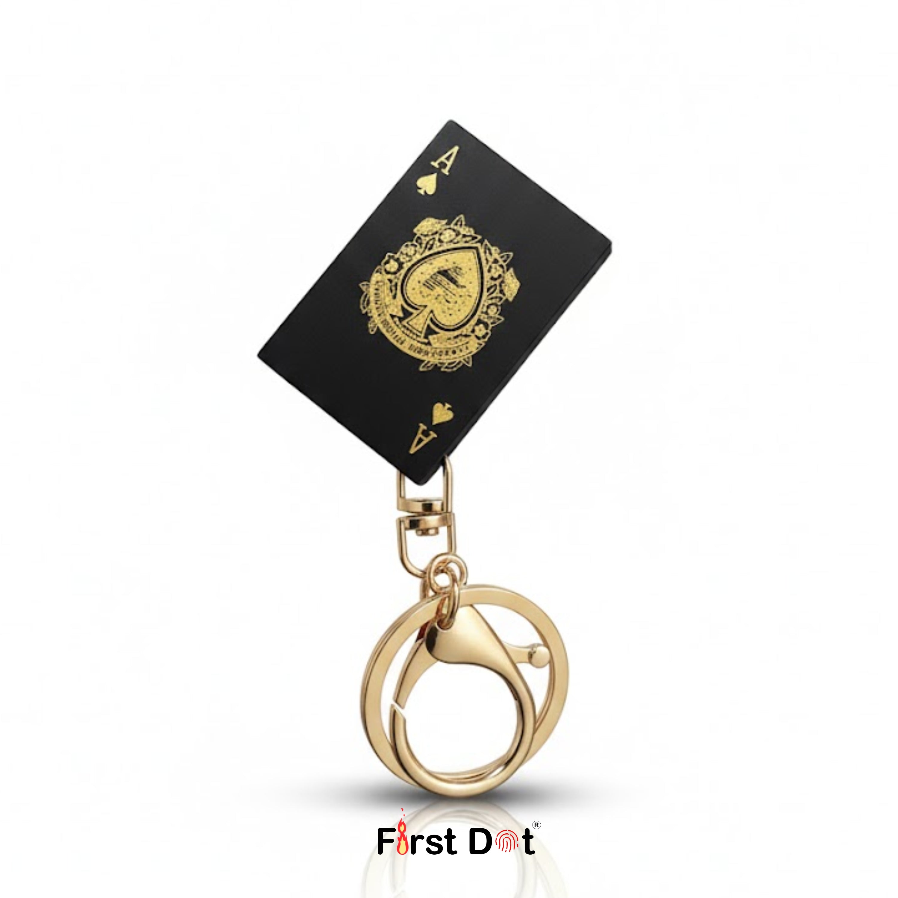 Gold keychain with a black playing card featuring a gold ace of spades design on a white background.