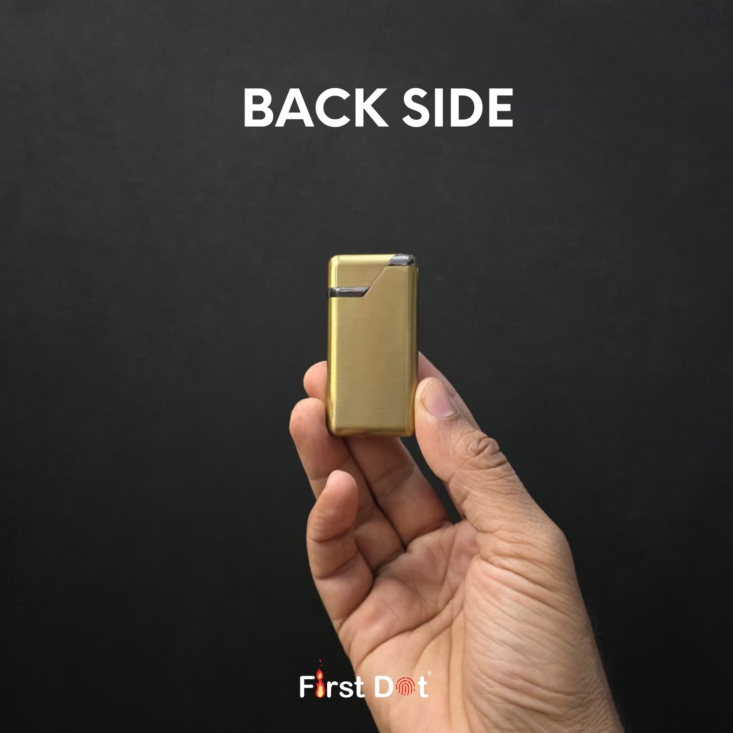 Gold lighter held in a hand with 'Back Side' text on a black background, featuring 'First Dot' branding.