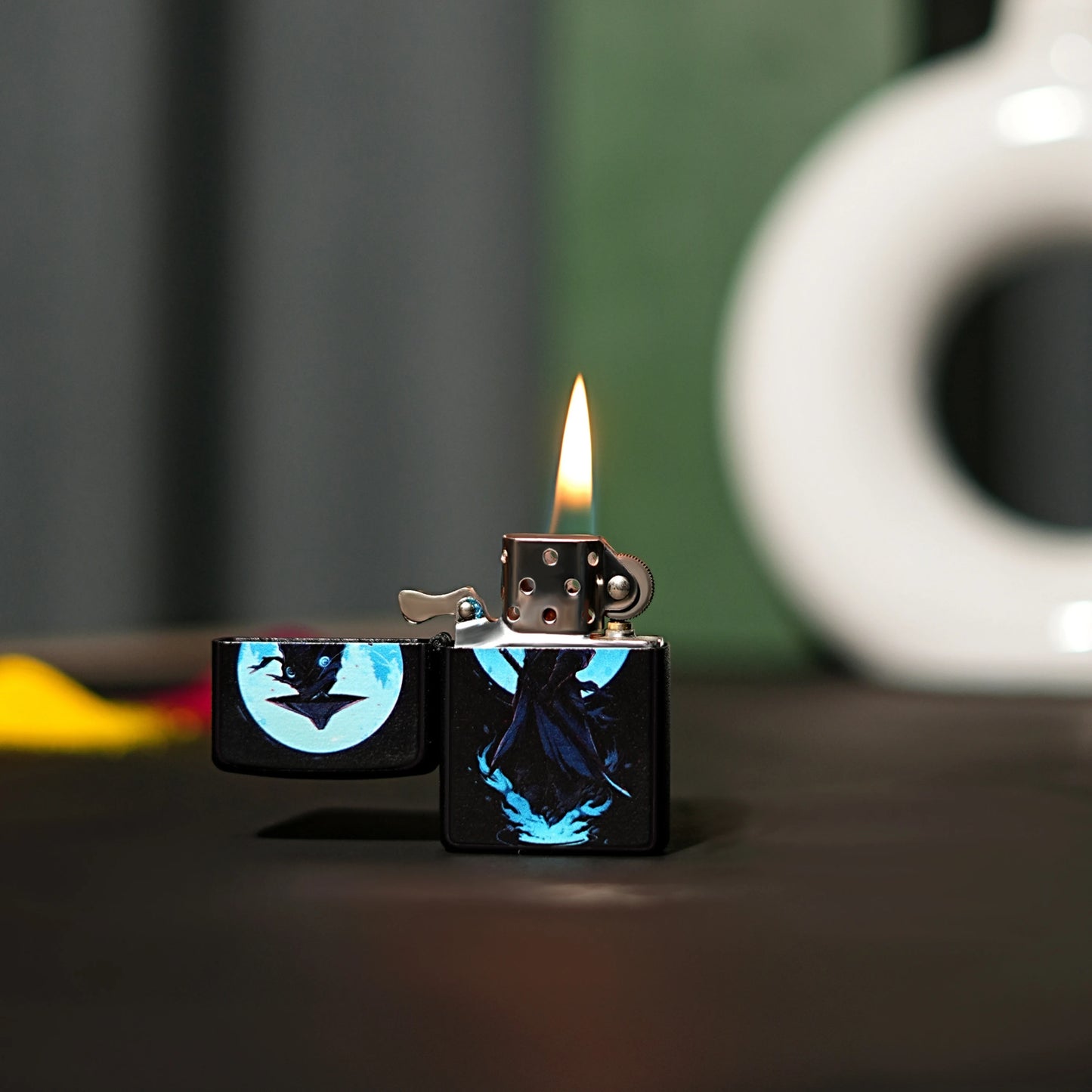 Lighter with a bat design on a dark surface with a blurred background Blue Eye Samurai Premium Refillable Cigarette Lighter first dot 