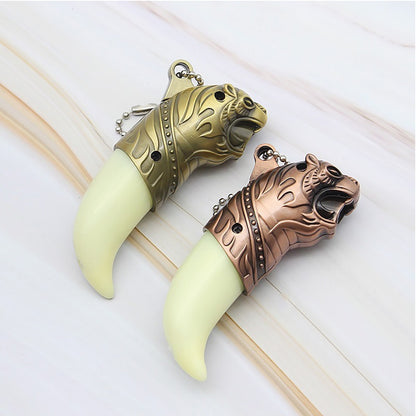 Decorative items resembling lion's claws with gold and bronze accents on a light background Tiger's Roar Jet Flame Cigarette Lighter