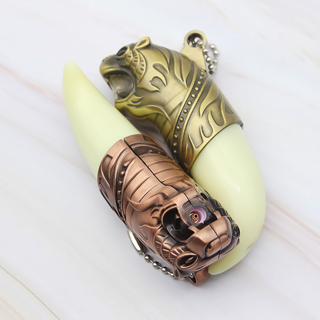 Decorative keychain with intricate designs on a white background Tiger's Roar Jet Flame Cigarette Lighter