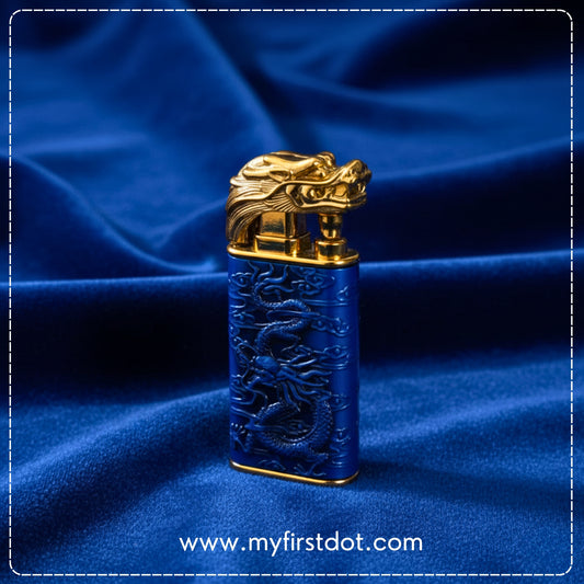 Blue lighter with gold dragon design on a blue fabric background