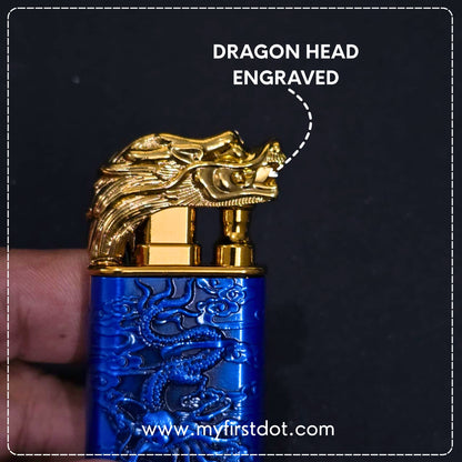 Blue lighter with gold dragon head design, held by a hand against a dark background.