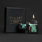 Black textured notebook with 'First Dog' branding and a lit lighter with text on a dark background Eat Sleep Trade Repeat Candle Premium Refillable Cigarette Lighter