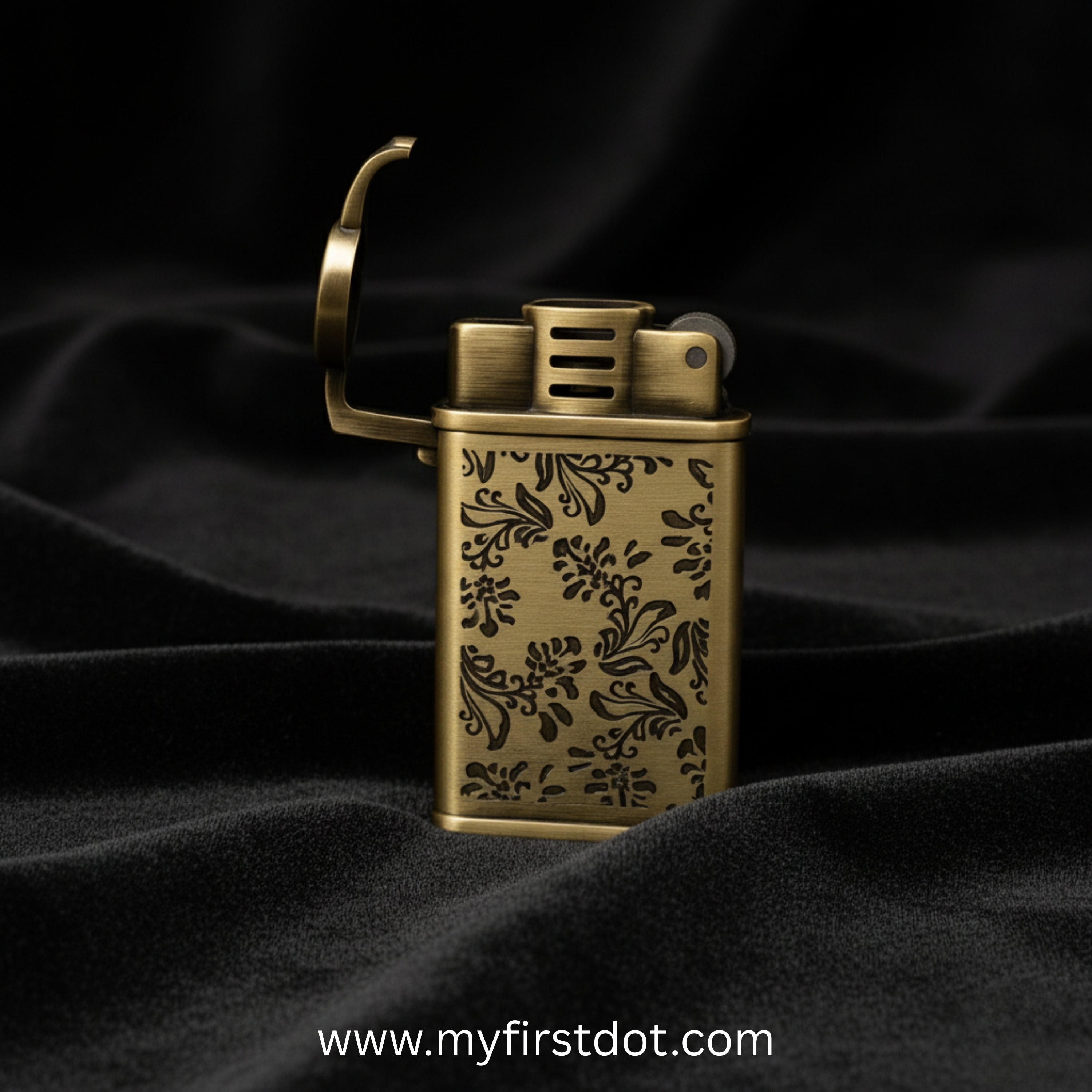 Bronze lighter with floral patterns on a dark fabric background Embossed Floral Pattern Slim Jet Fire Cigar Windproof Lighter