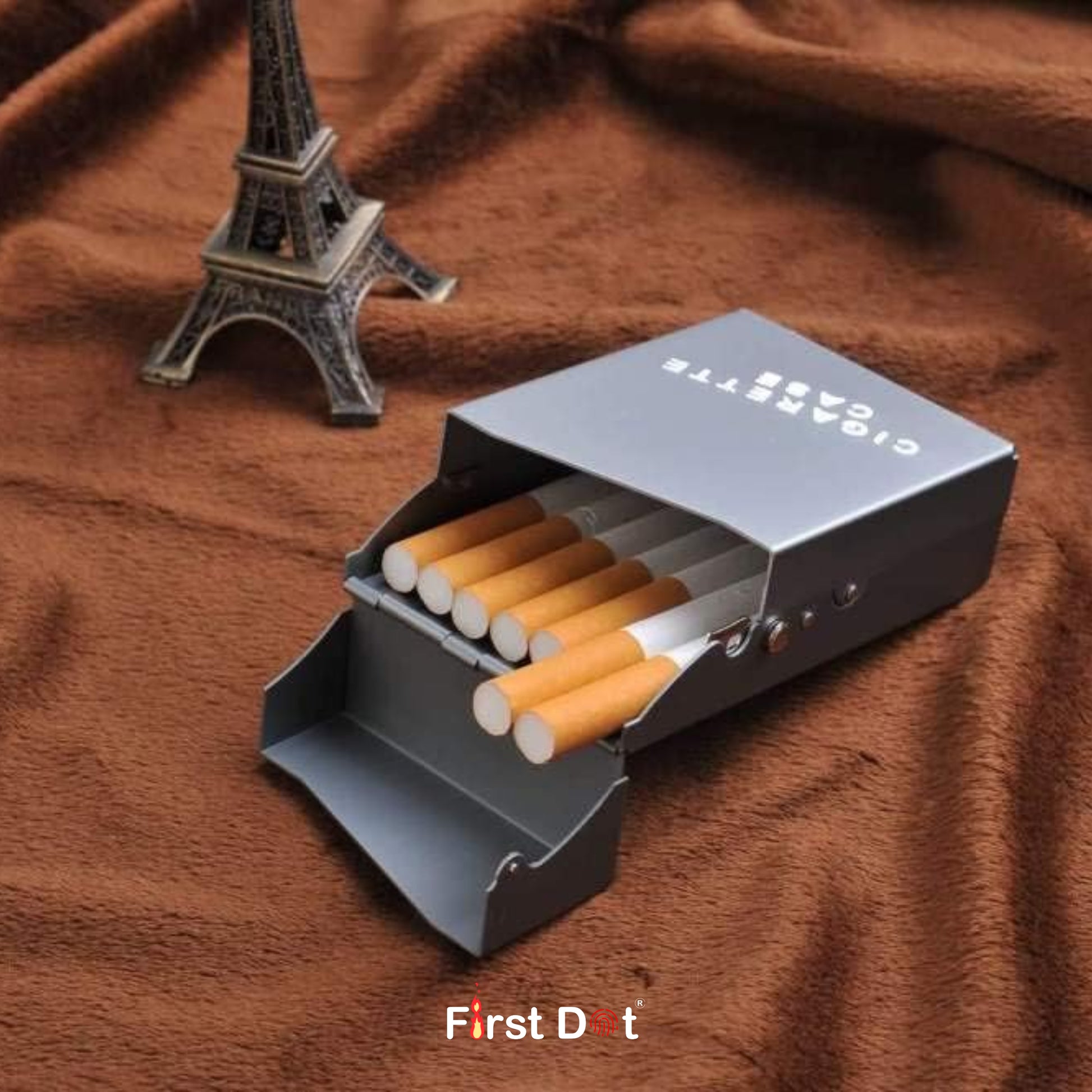 Open cigarette case with cigarettes on a brown fabric background