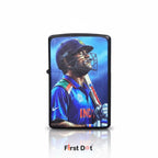 Lighter with a cricket player design on a white background