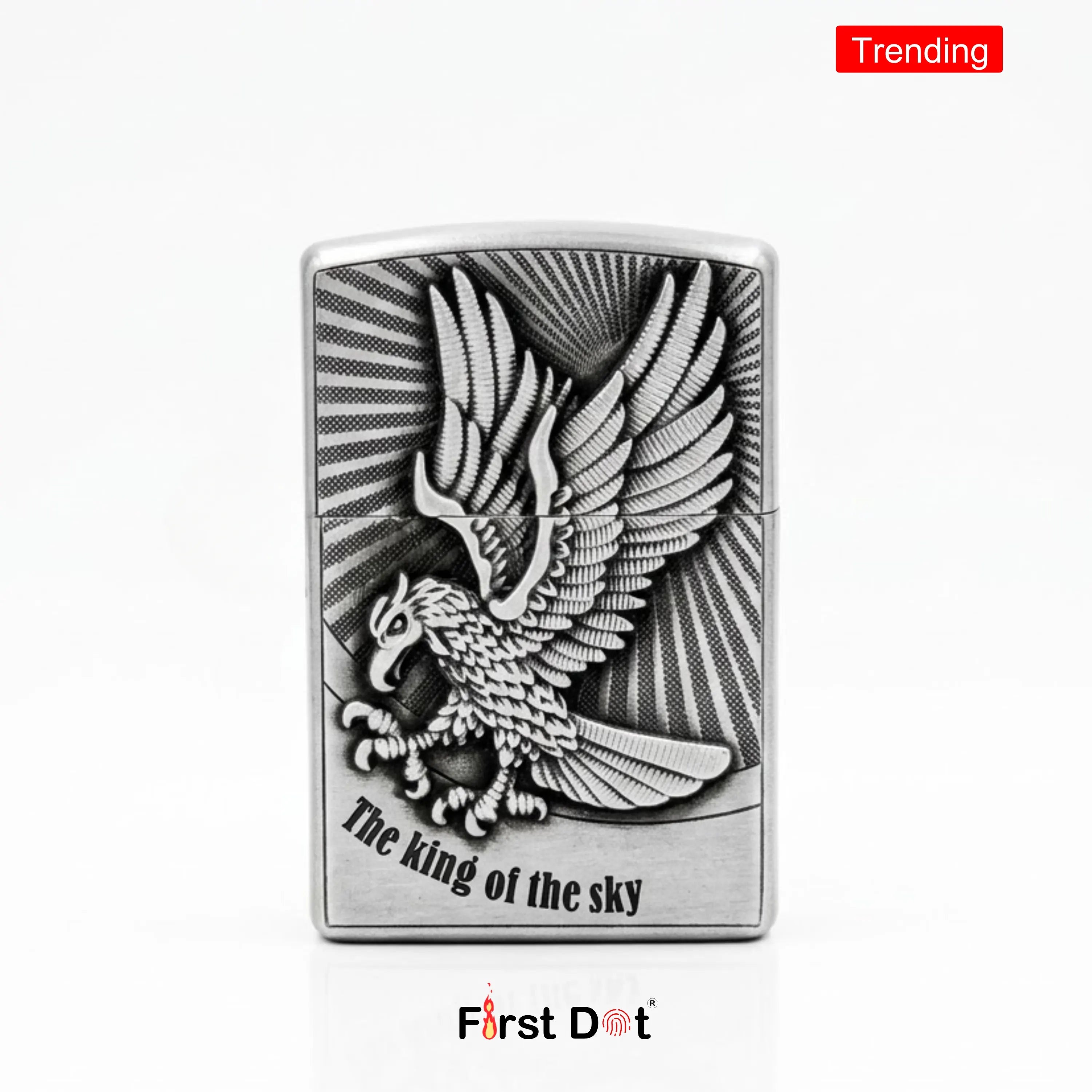 Metallic lighter with an eagle design and 'The King of the Sky' text on a white background.