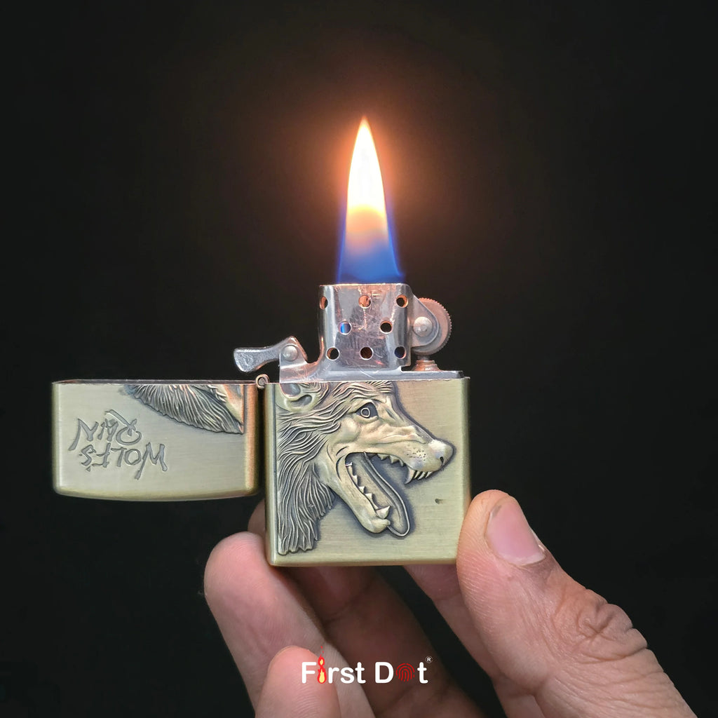Hand holding a lighter with a wolf design and lit flame on a dark windproof cigarette lighter online in Indiabackground
