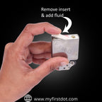 Hand holding a small device with text 'Remove insert & add fluid' on a black background