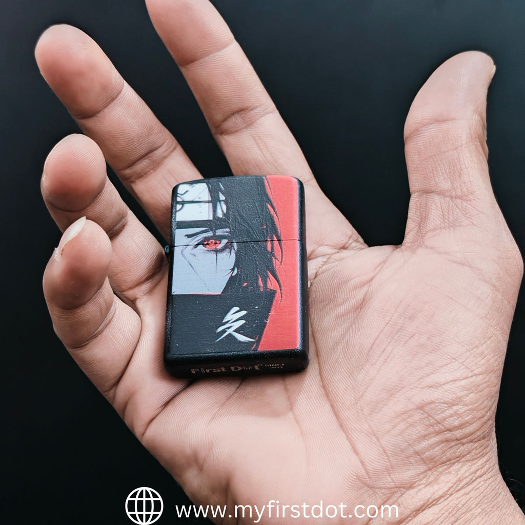 Hand holding a small rectangular device with a graphic design on a black background