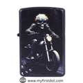 A black metal cigarette lighter with a printed graphic of a skull riding a motorbike on the front.