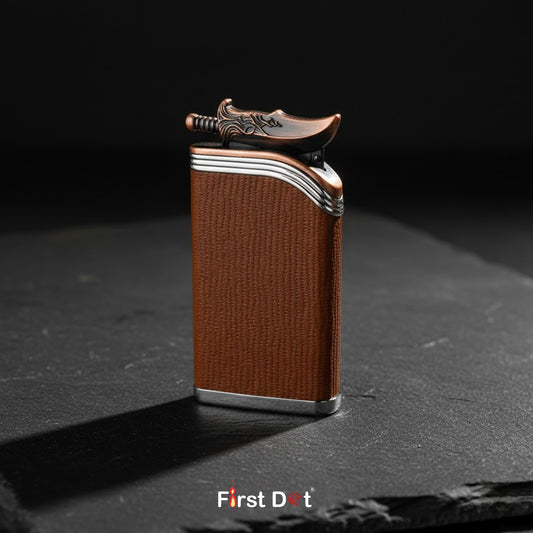 Brown textured lighter with decorative top on a dark surface, branded 'First Dot'.