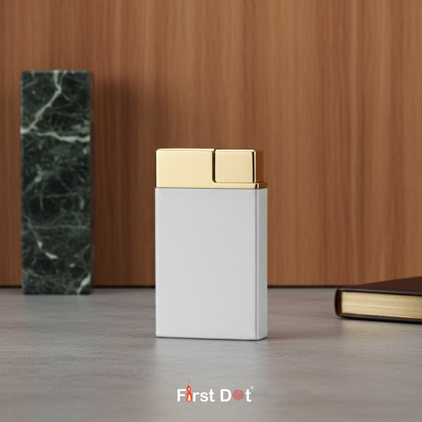 White and gold VintageCigaretteLighter on a wooden surface with 'First Dot' branding.
