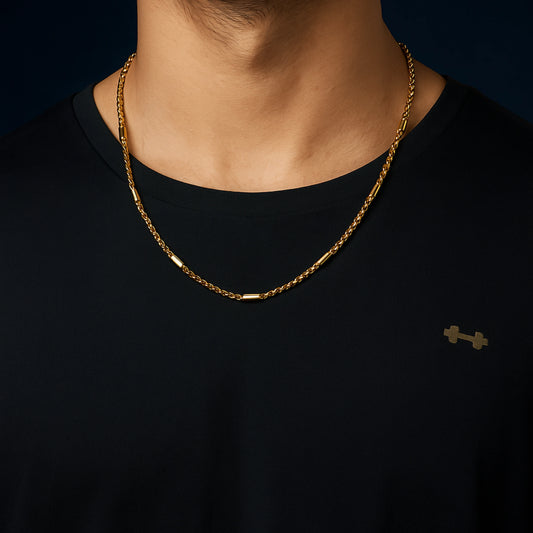 Gold chain necklace on a black shirt against a dark background First Dot Golden Ball Beaded Chain for Men 