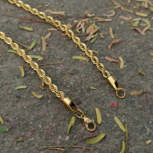 Gold rope chain necklace on a textured surface with dried leaves Golden Rope Chain for Men – Classic Stylish Necklace
