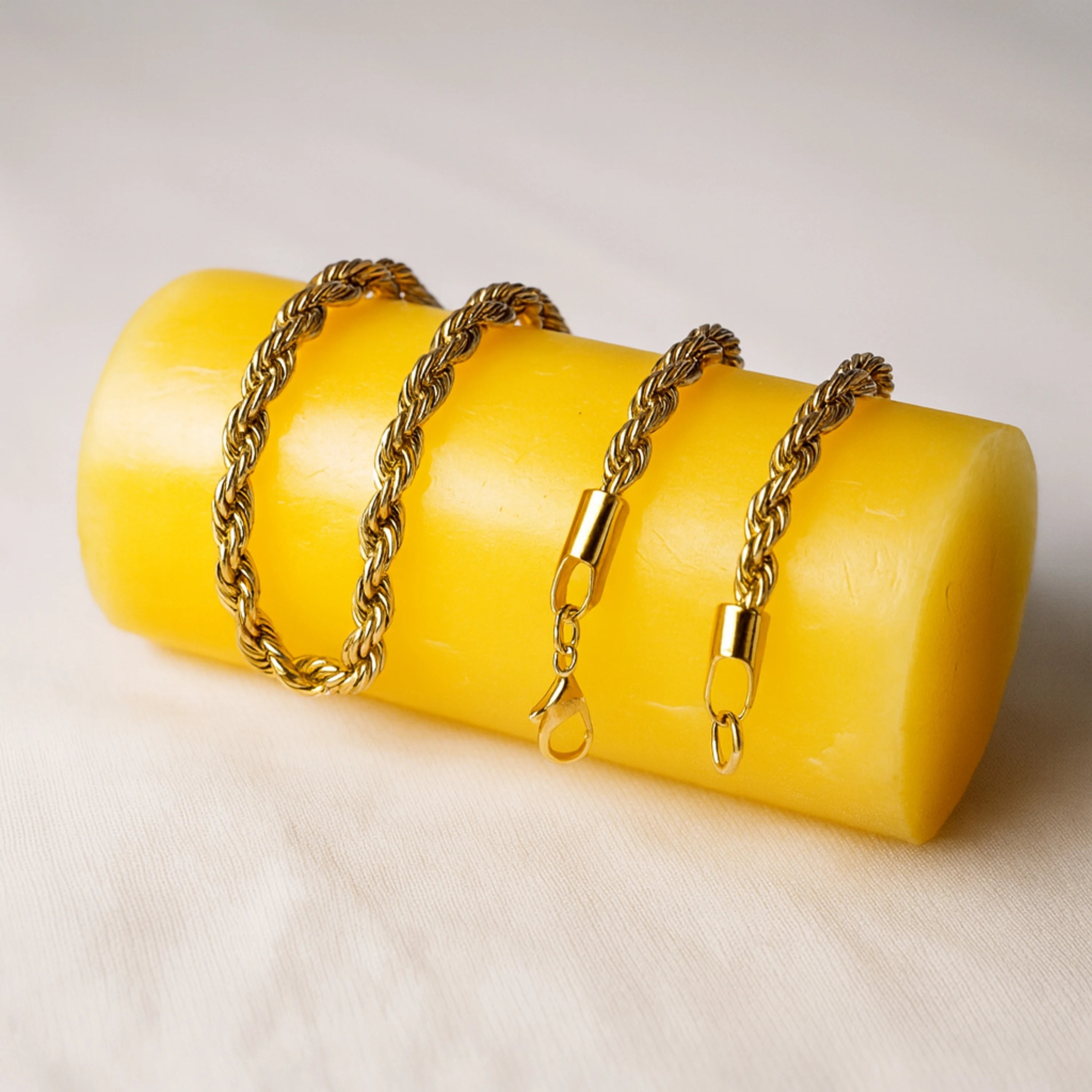 Yellow clutch with gold chain on a light background Golden Rope Chain for Men – Classic Stylish Necklace
