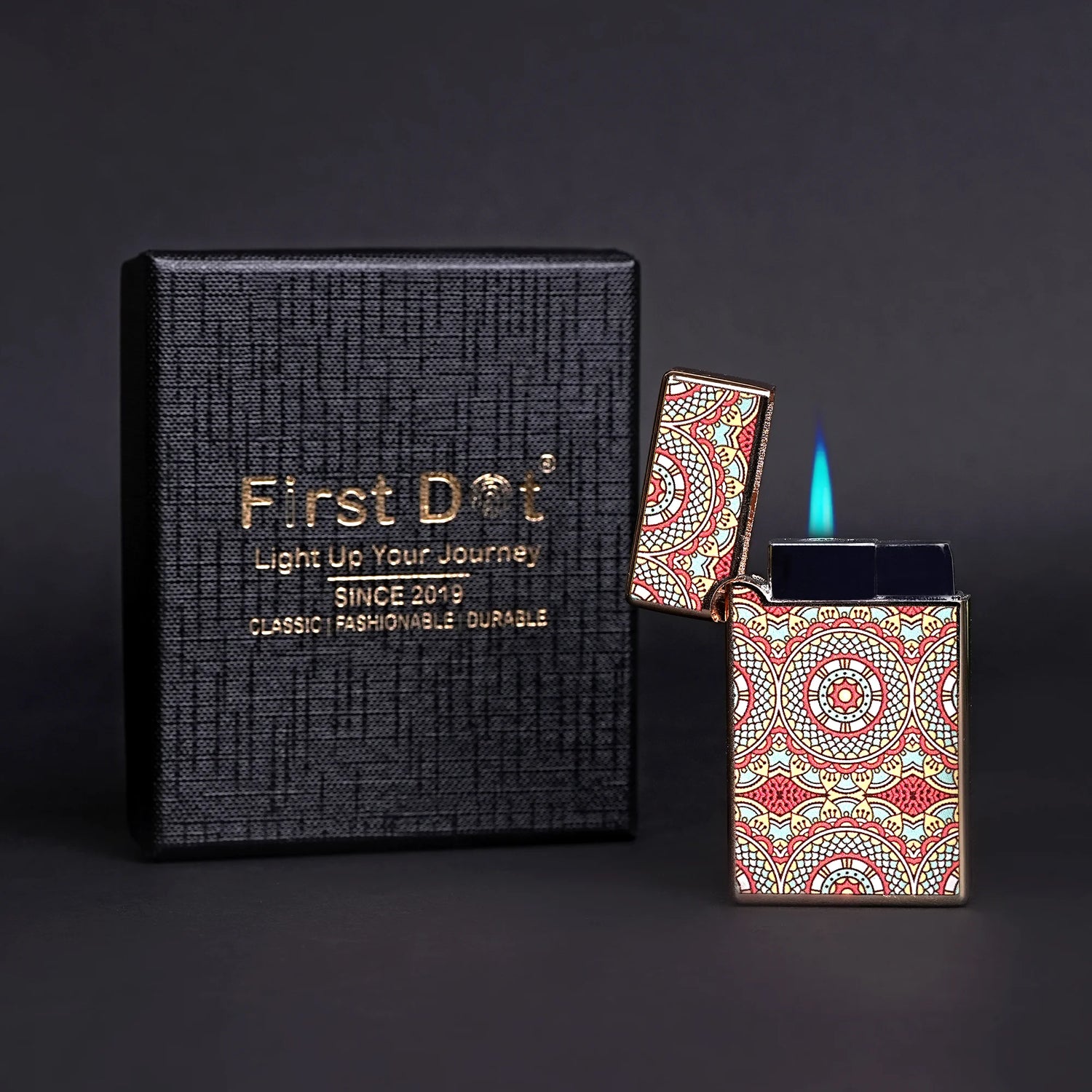 Decorative lighter with 'First Dot' packaging on a dark background Mandala Art Premium Refillable Cigarette Lighter Gold