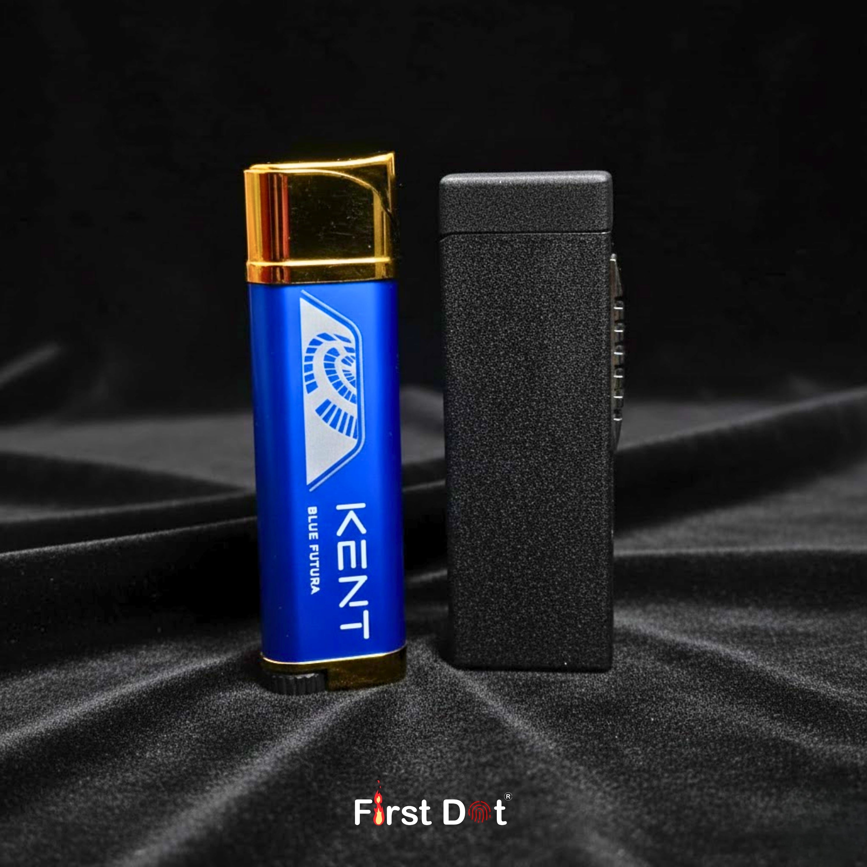 Blue Kent lighter with gold top on a black fabric background