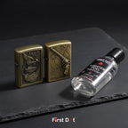 Two brass lighters and a bottle of lighter fuel on a dark surface with 'First Dot' branding.