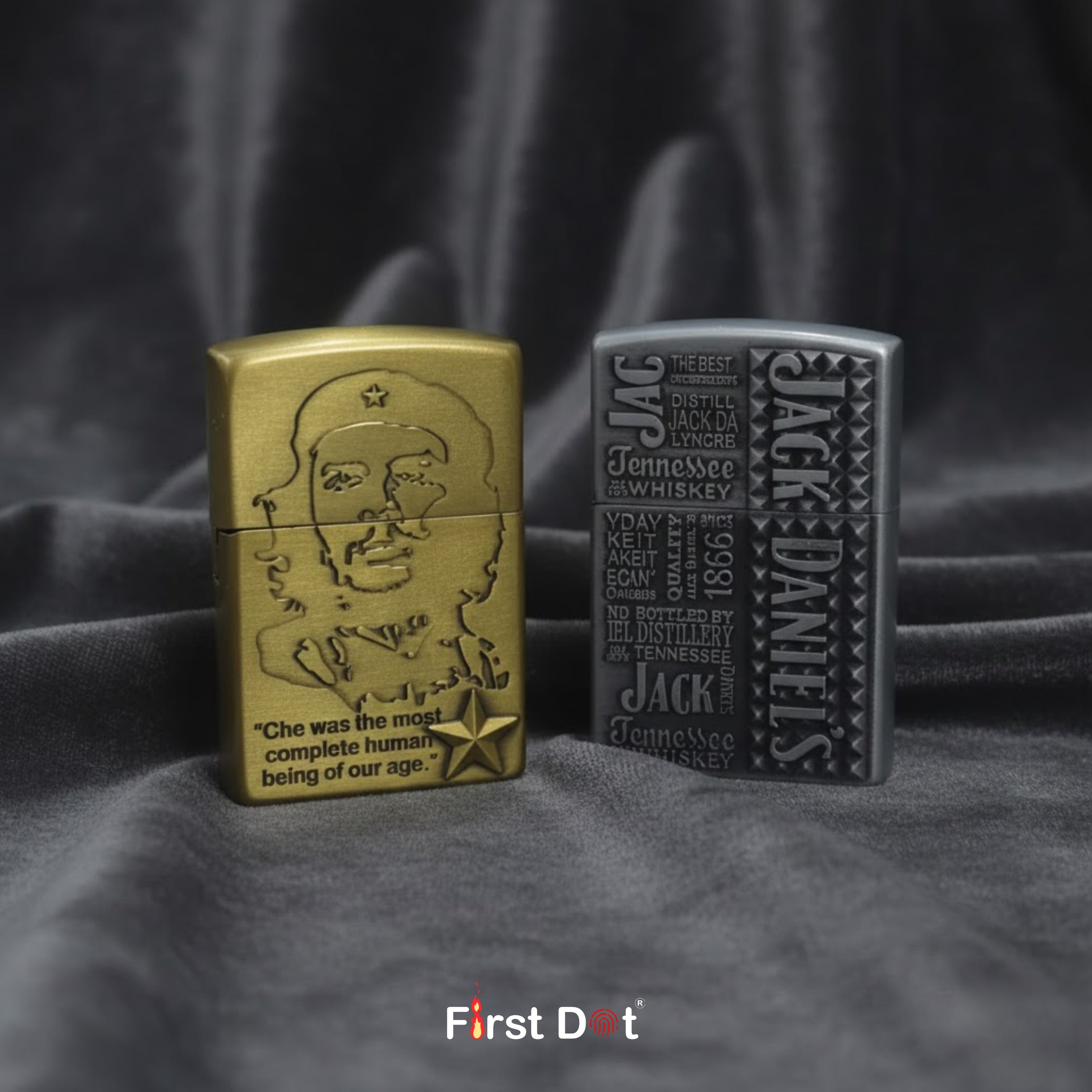 Two lighters, one gold and one gray, on a dark fabric background with 'First Dot' branding.