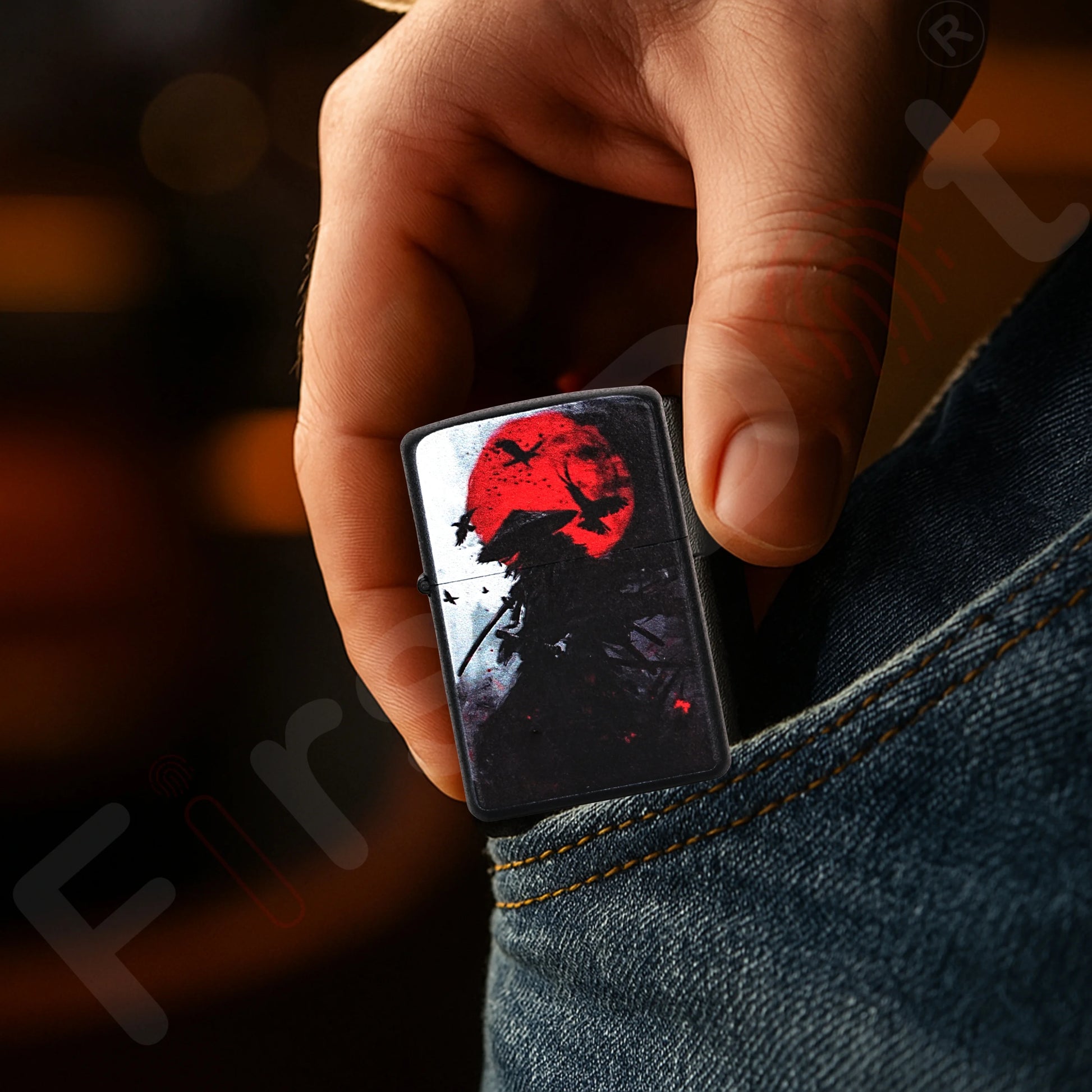 Hand holding a First dot lighter with a red and black design against a blurred background Samurai Warrior Premium Refillable Cigarette Lighter
