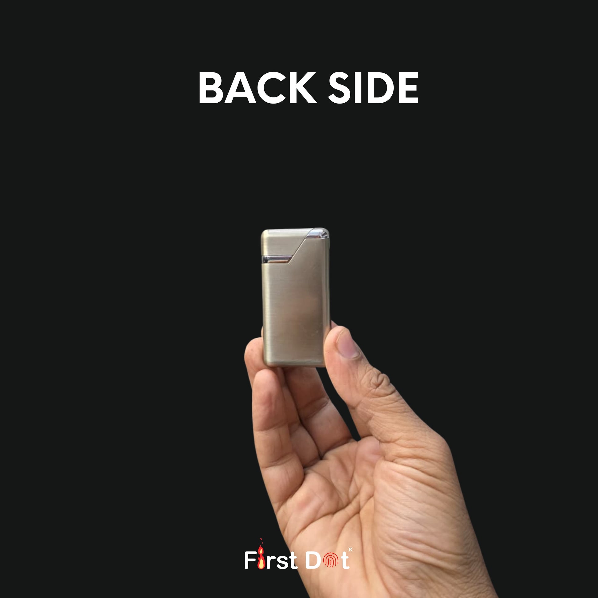 Hand holding a small metallic device labeled 'First Dot' on a black background with 'BACK SIDE' text.
