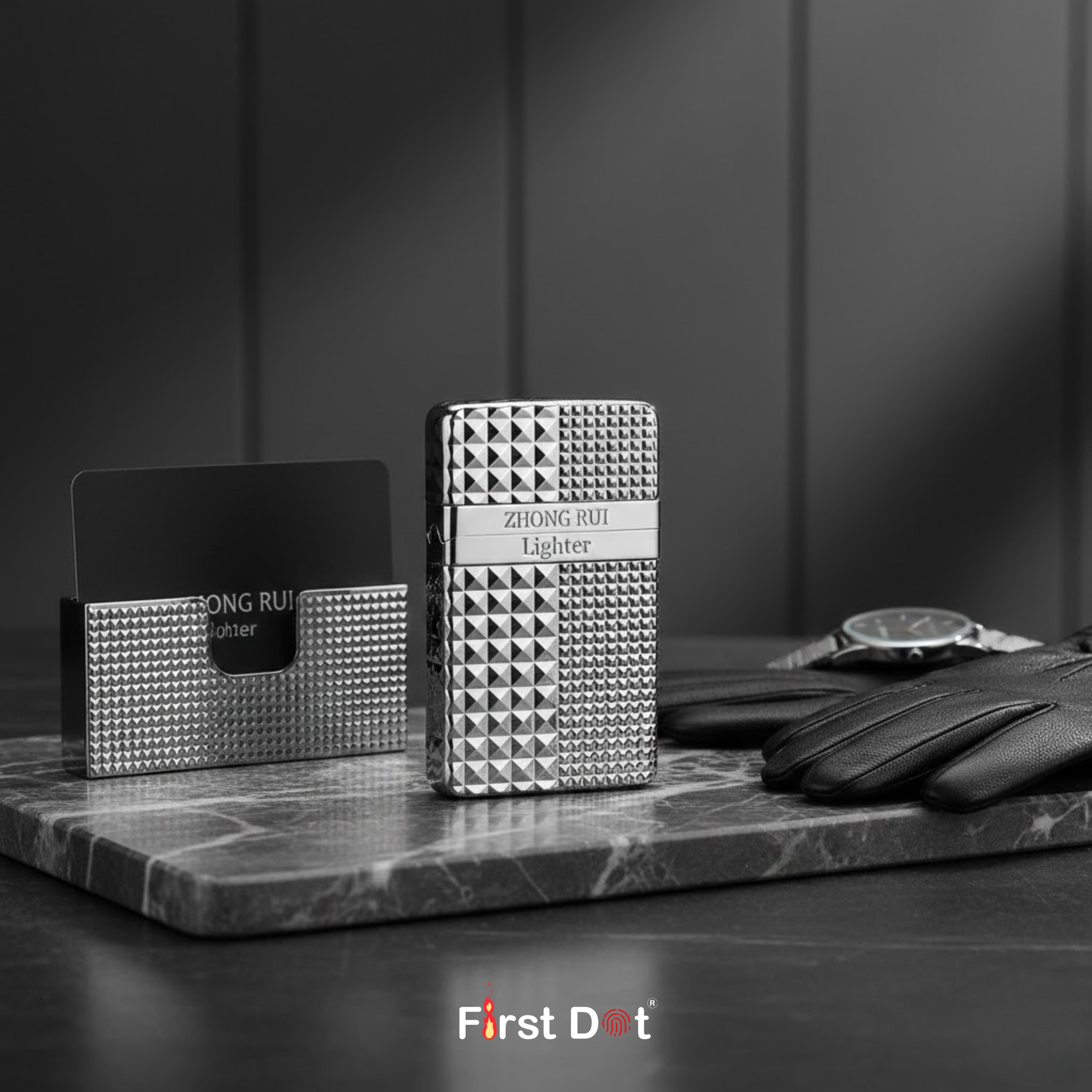 Silver lighter with Diamond cut design on a marble surface, with 'First Dot' branding.