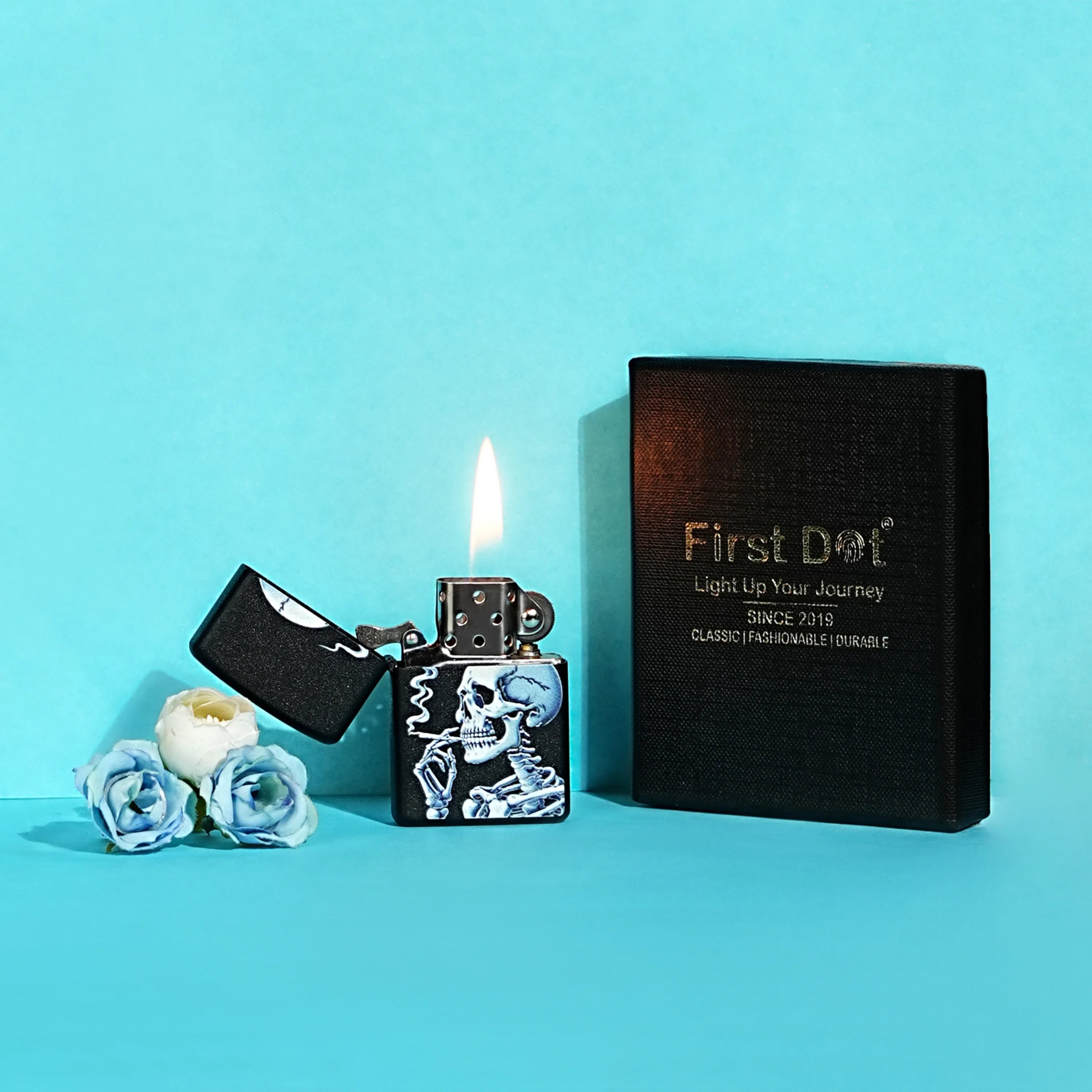 Lighter with skull design, black case, and 'First Dot' branding on a blue background Skull Premium Refillable Cigarette Lighter