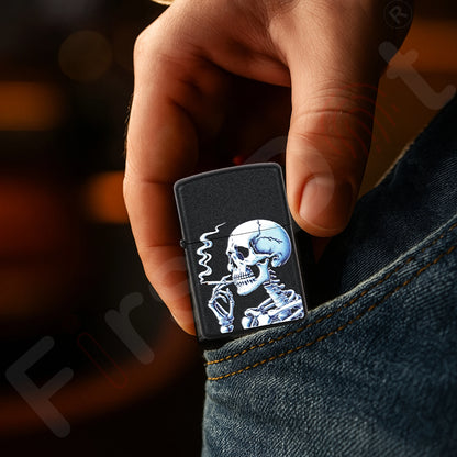 Hand holding a black lighter with a skull design against a blurred background Skull Premium Refillable Cigarette Lighter