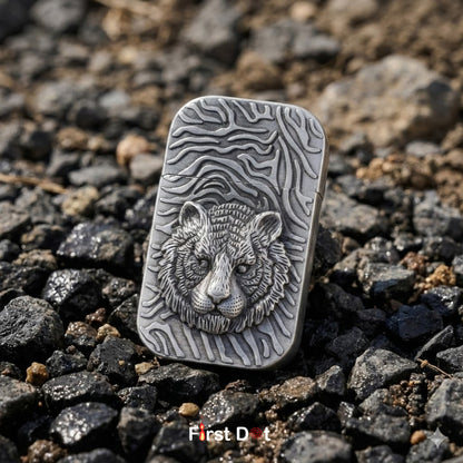 Metallic bear head design on a textured surface with 'First Dot' branding.