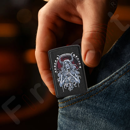 Hand holding a black lighter with a design on a blurred background Witch Premium Refillable Cigarette Lighter