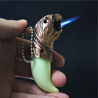 Tiger-shaped lighter with a glowing blue flame on a dark background Tiger's Roar Jet Flame Cigarette Lighter