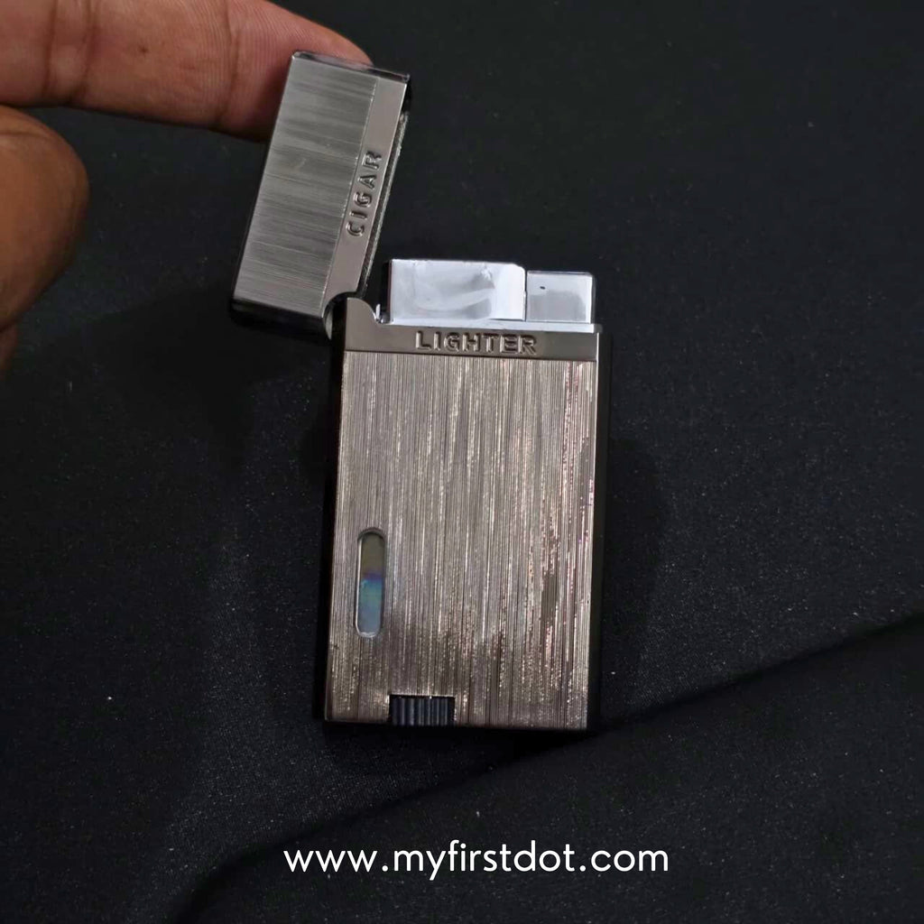 Metallic lighter on a black background with 'www.myfirstdot.com' text. Monarch Double Flame Torch Lighter Brushed Grey