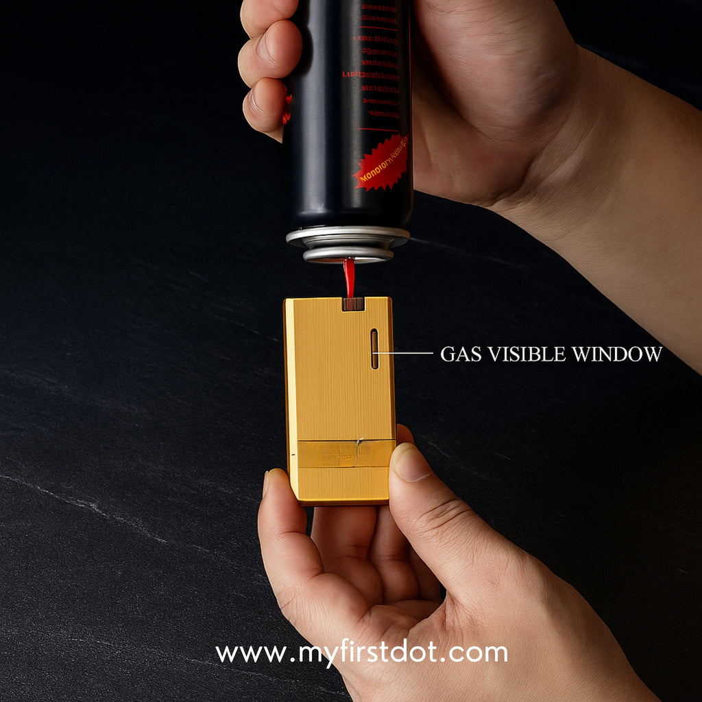 Hand using a can to fill a gold lighter with visible gas window on a black background. Monarch Double Flame Torch Lighter Metallic Gold