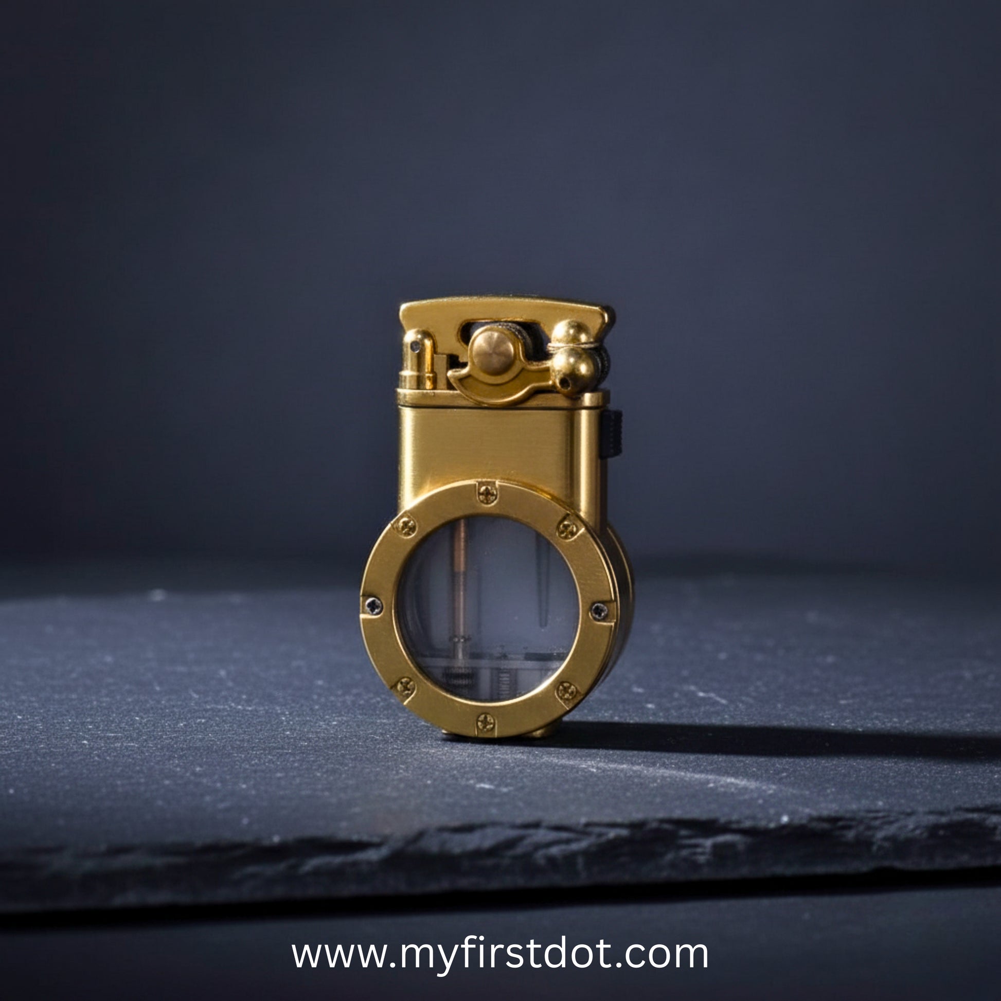 Gold-colored mechanical device on a dark surface with a dark background first dot Vintage Trench Retro Rocker Lighter | Dual Flame Lighter
