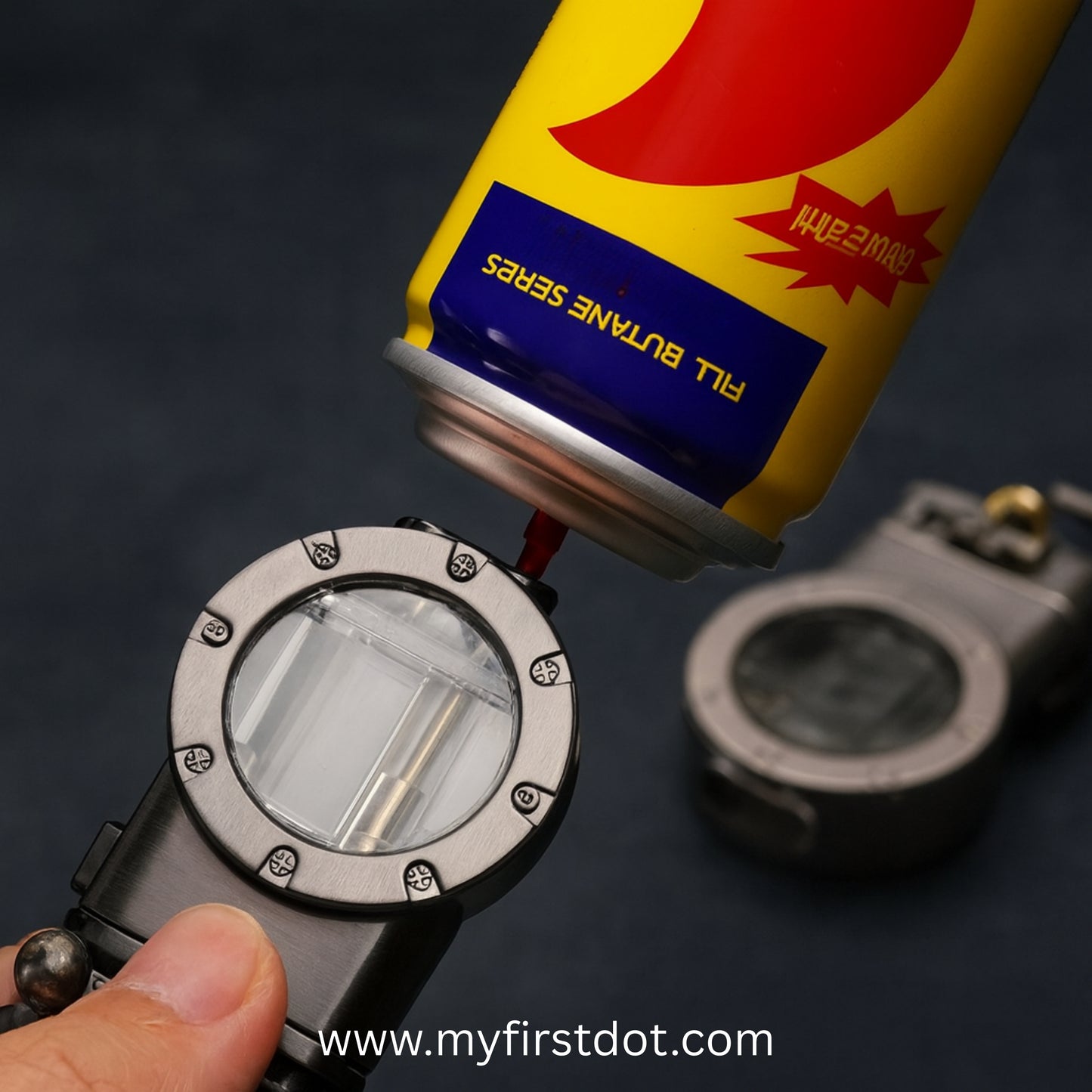 Butane canister being inserted into a butane lighter on a dark background first dot Vintage Trench Retro Rocker Lighter | Dual Flame Lighter